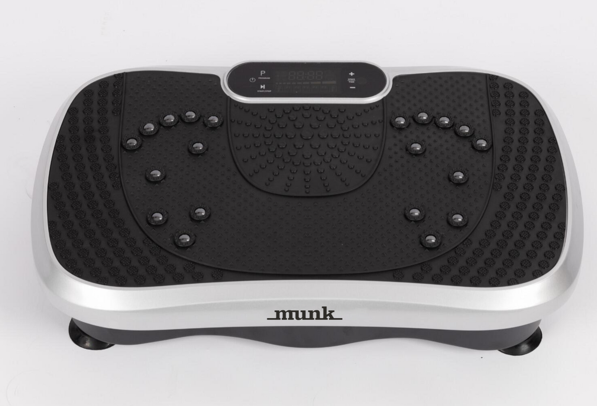 Munkwell Vibrationstræner med display og munk-logo, set forfra